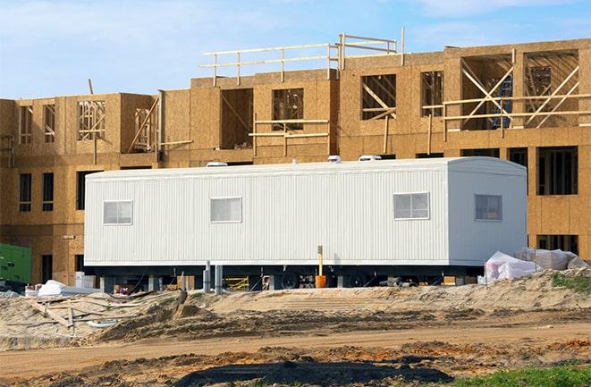 crane lifting modular building for construction office rentals in Monterey Park, CA